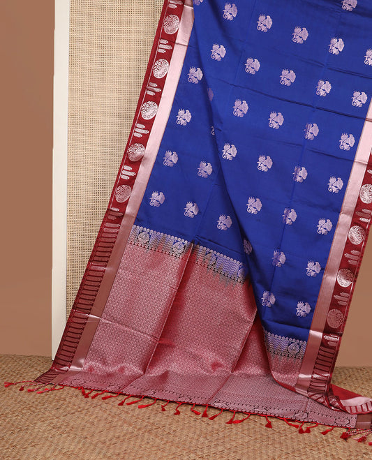 Blue zari buttas silk saree, contrast temple geometric patterned border, and jaal pallu