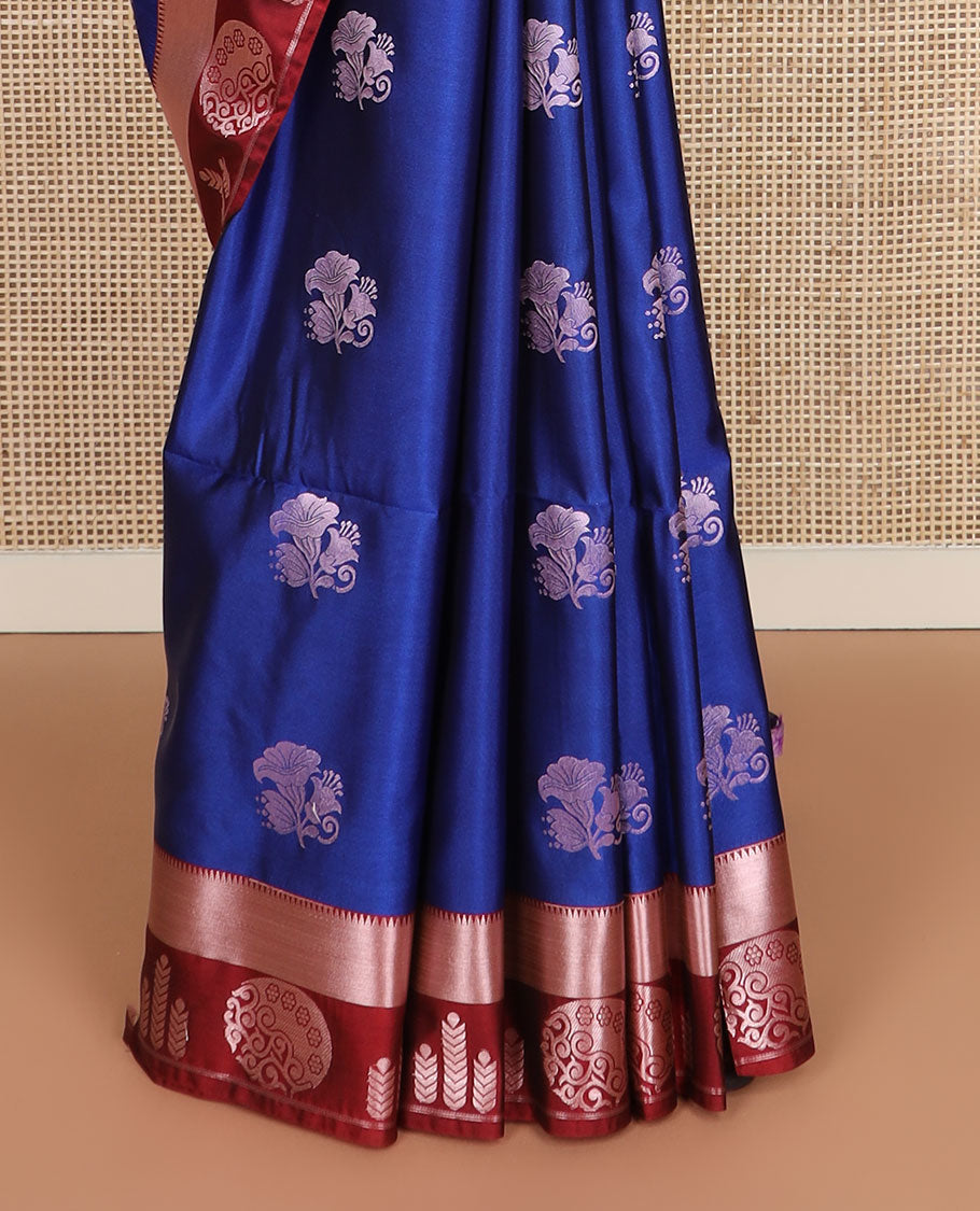 Blue zari buttas silk saree, contrast temple geometric patterned border, and jaal pallu