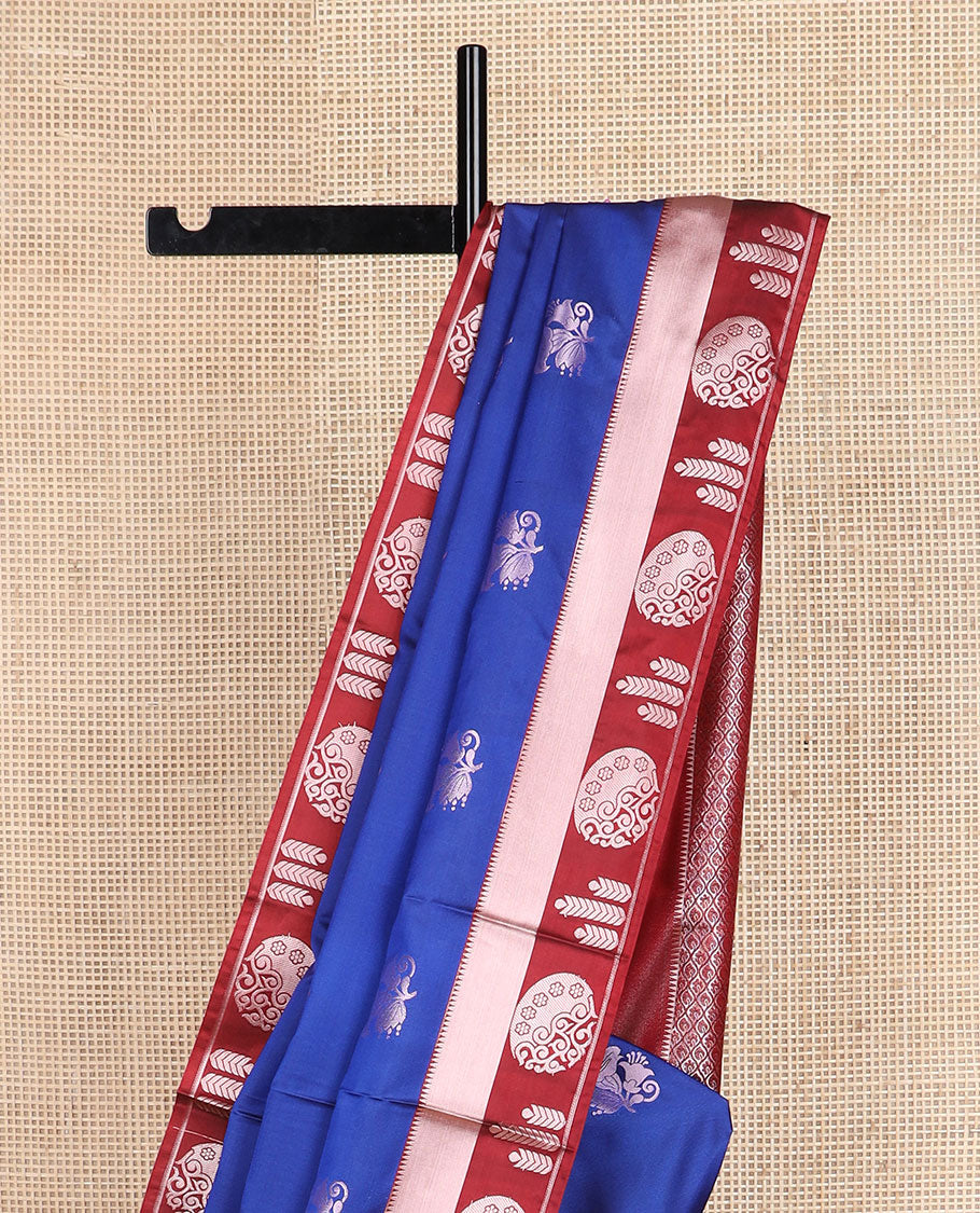 Blue zari buttas silk saree, contrast temple geometric patterned border, and jaal pallu