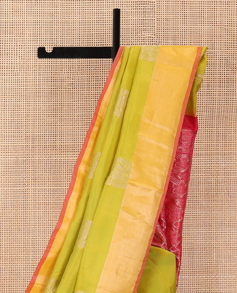 Light green zari buttas Uppada saree, contrast bavanji border, and intricate pallu