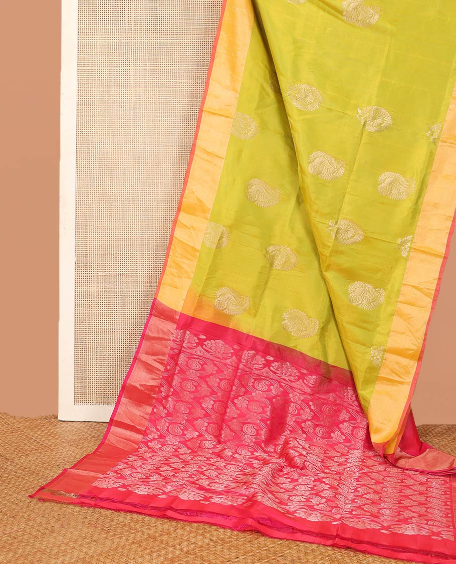 Light green zari buttas Uppada saree, contrast bavanji border, and intricate pallu
