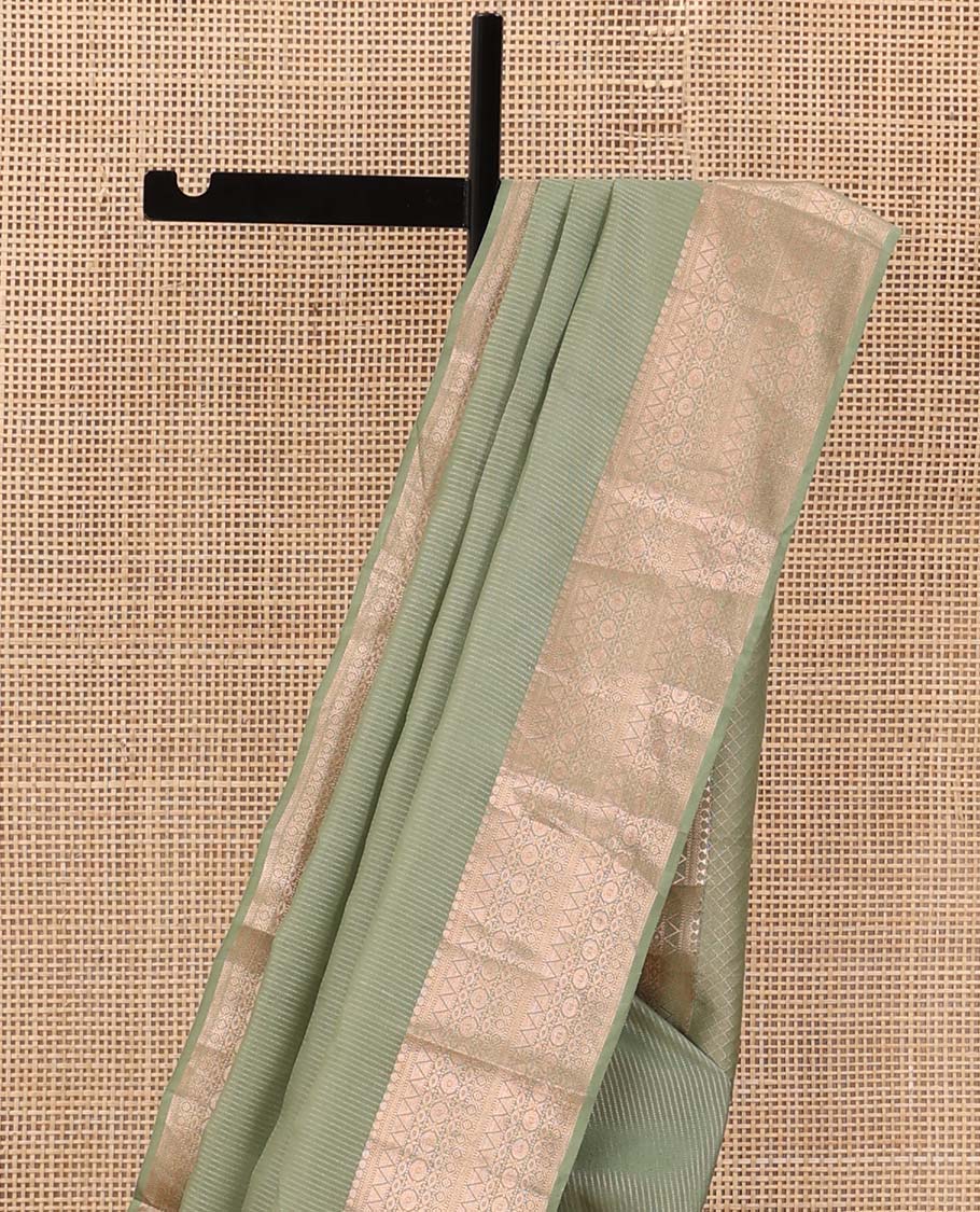 Green zari stripes Vasundhara silk mix saree, traditional zari design border, and intricate pallu