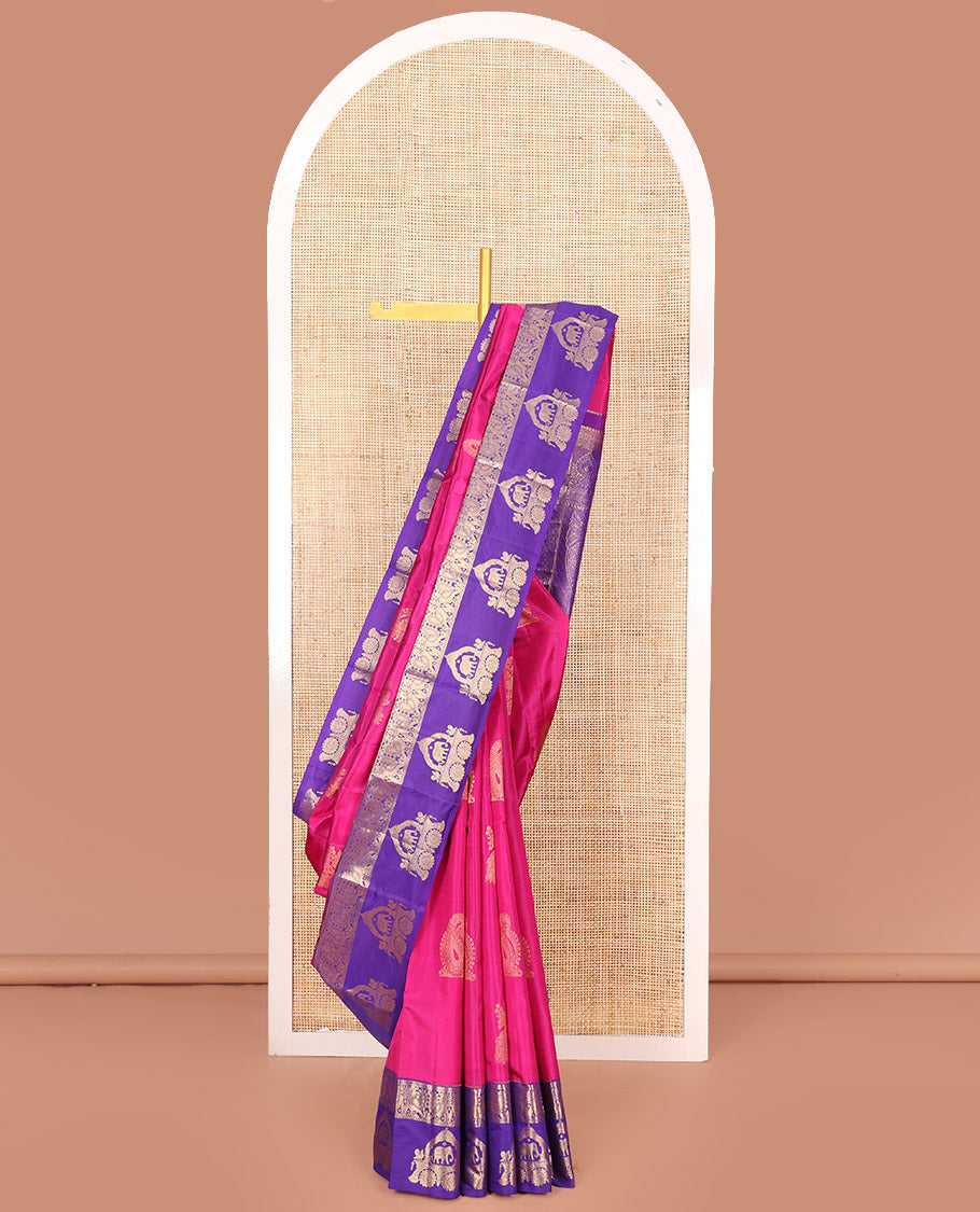 Pink Vasundhara Silk Saree Embellished with Zari Buttas All Over Its Body, Highlighted by Contrast Zari Border of Rekku, Mayil, and Chariot Designs, a Grand Pallu of Diagonal Stripes, and Paired with a Contrast Blouse