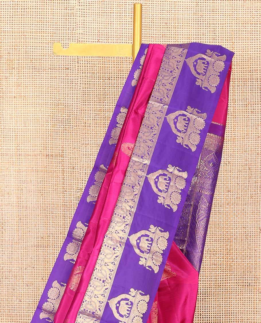 Pink Vasundhara Silk Saree Embellished with Zari Buttas All Over Its Body, Highlighted by Contrast Zari Border of Rekku, Mayil, and Chariot Designs, a Grand Pallu of Diagonal Stripes, and Paired with a Contrast Blouse