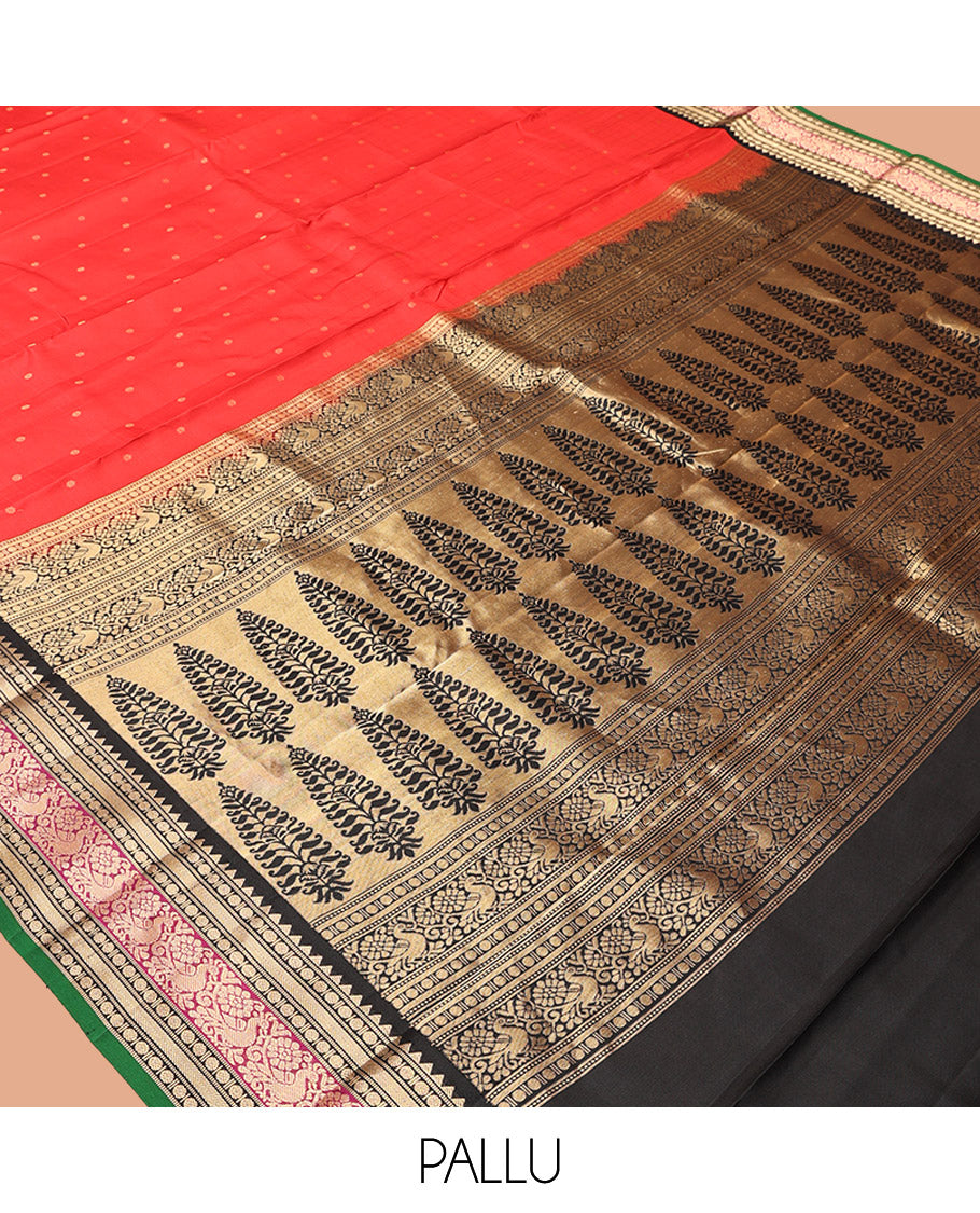 Red Vasundhara Silk Saree, Sparsely Woven with Zari Buttas All Over Its Body, Complemented by a Contrast Border of Rekku, Muthu, Poun, Kathir, and Mayil Designs, Beautifully Bedecked Pallu, and Paired with a Contrast Blouse