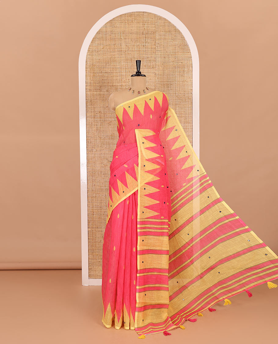 Pink thilakam buttas and mirror work khadi mul cotton saree, contrast temple border, striped and buttas pallu, and a contrast printed blouse