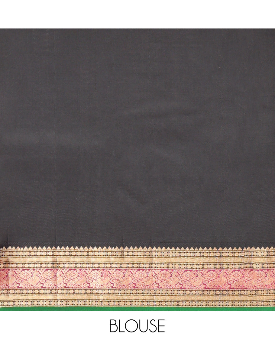 Red Vasundhara Silk Saree, Sparsely Woven with Zari Buttas All Over Its Body, Complemented by a Contrast Border of Rekku, Muthu, Poun, Kathir, and Mayil Designs, Beautifully Bedecked Pallu, and Paired with a Contrast Blouse