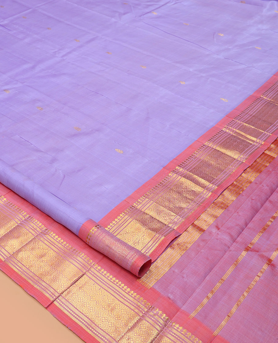 Lavender Kanchipuram Silk Saree, Embellished with Zari Buttas, Complemented by a Contrast Border of Panner Sombu, Banaras, Muthu, and Jaal Design, Zari Design Pallu, and No Blouse