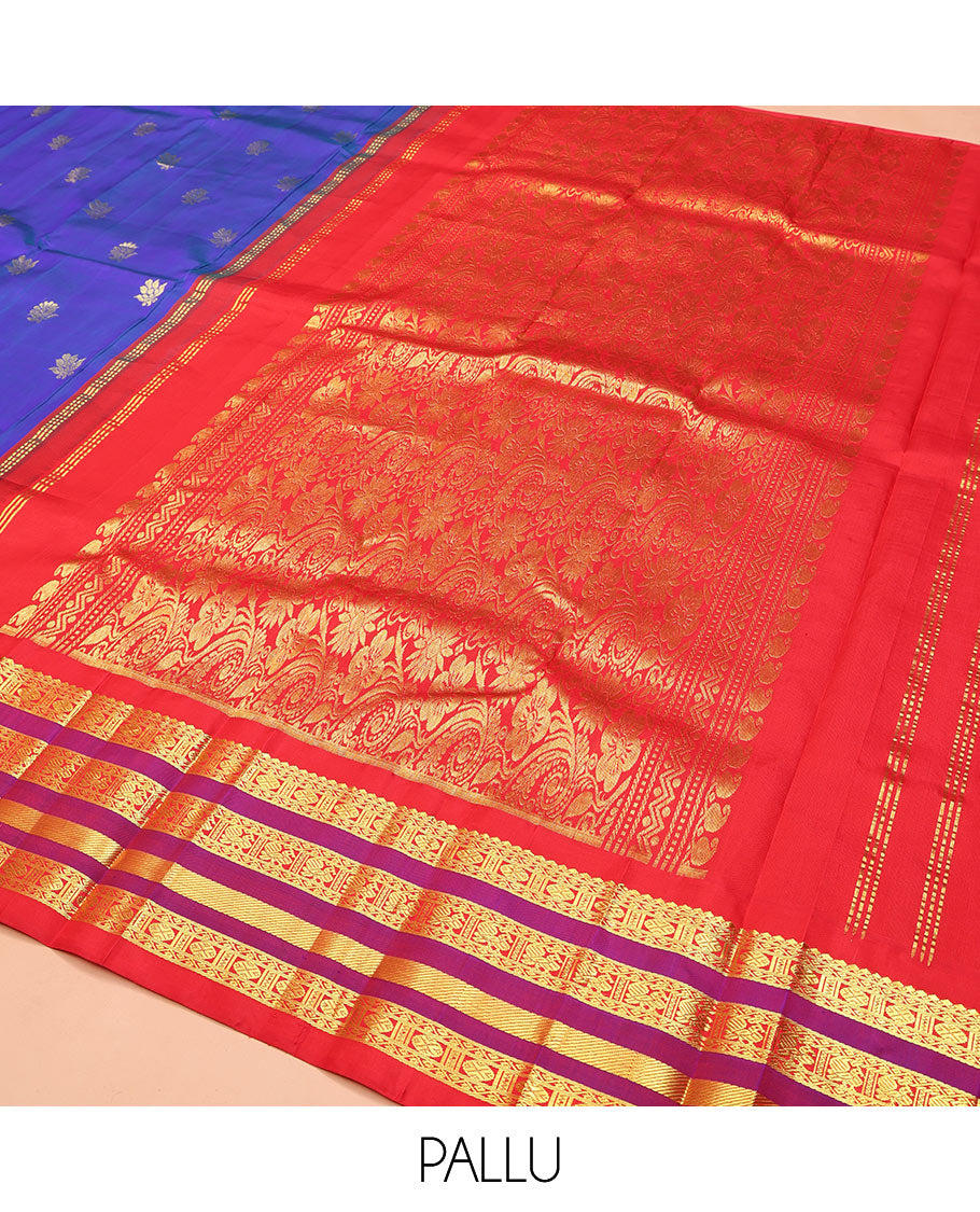 Blue Kanchipuram Silk Saree, Meticulously Crafted with Zari Buttas on Its Body, Complemented by Contrast One-Sided Border of Thilakam Mokku, Neli, Rudraksham, and Mayil Designs, Grandly Woven Pallu of Floral Designs, and Comes Without a Blouse