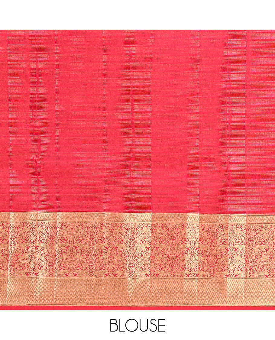 Red Vasundhara Silk Saree, Elegantly Highlighted with Zari Buttas, Highlighted by a Vanasingaram-Style Zari Vanki Border, Jaal Pallu, and a Matching Blouse