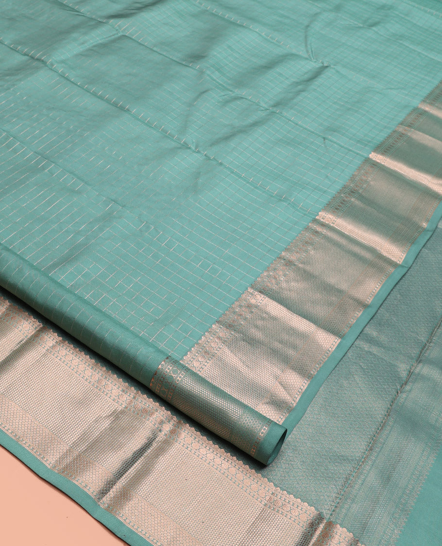 Green Kanchipuram Silk Saree, Richly Detailed with Checks, Zari Border of Mayil Kann, and Rudraksham Designs, Sparsely Woven Pallu, and Matching Blouse