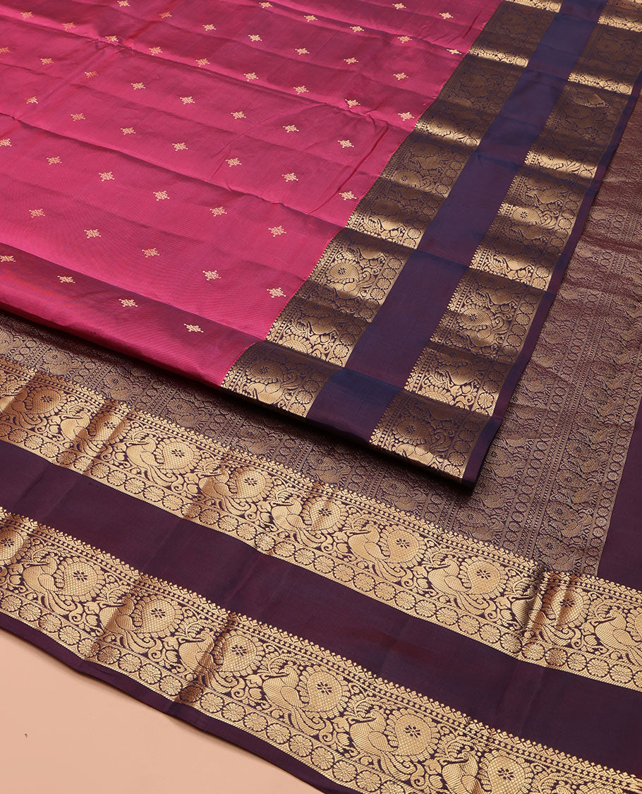 Pink Vasundhara Lite Silk Mix Saree, Bedecked with Zari Buttas, Complemented by a Contrast Rettai Pettu Border of Mayil, and Kamalam Designs, Pallu Pictures the Same Designs, and Paired with a Contrast Blouse