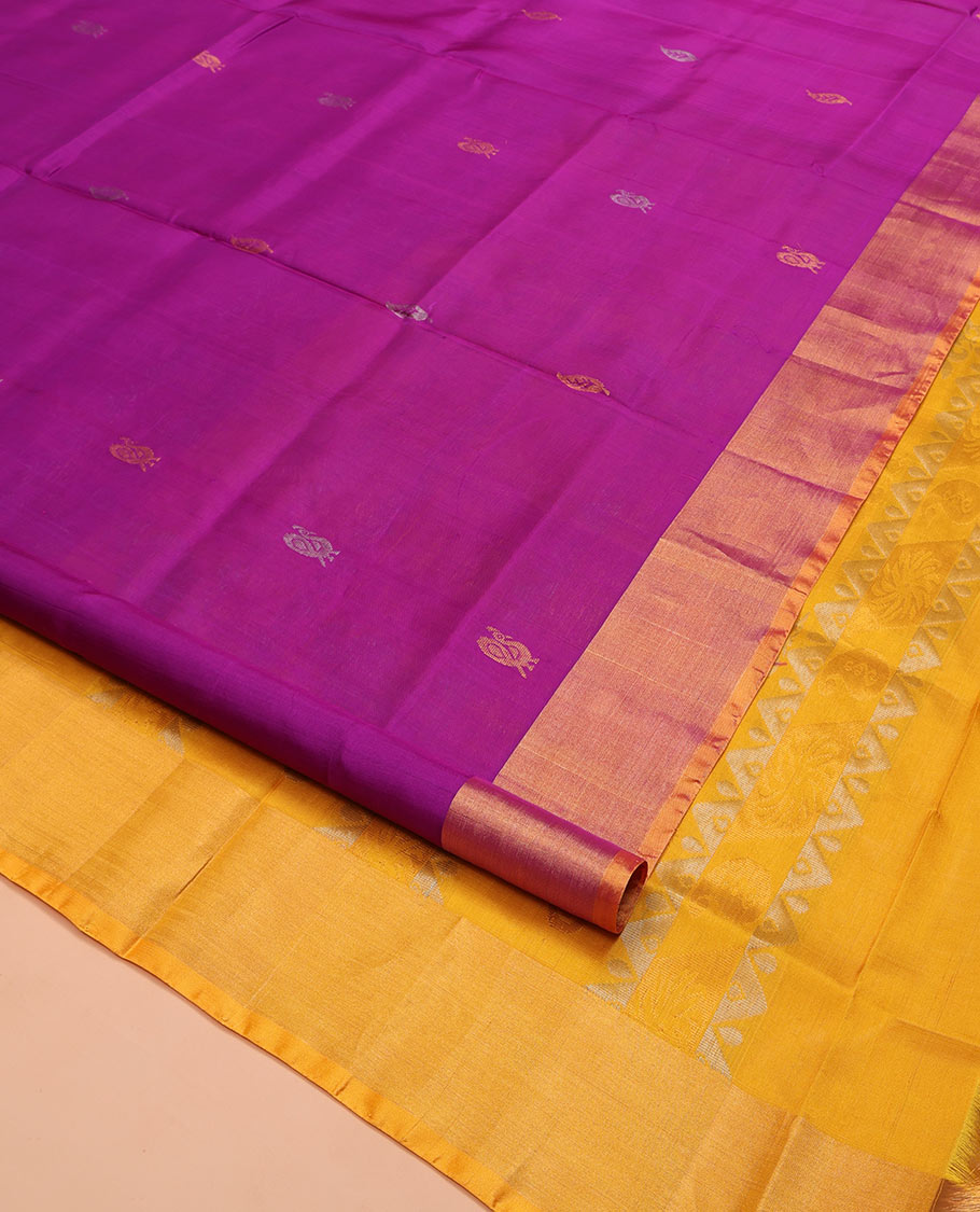 Rani Pink Uppada Silk Saree, Decorated with Zari Buttas All Over Its Body, Complemented by a Contrast Plain Border, Pallu Features Peacock Designs, and Paired with a Contrast Blouse