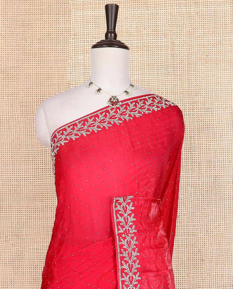 Red stone work designer saree, floral motifs micro-stone work border