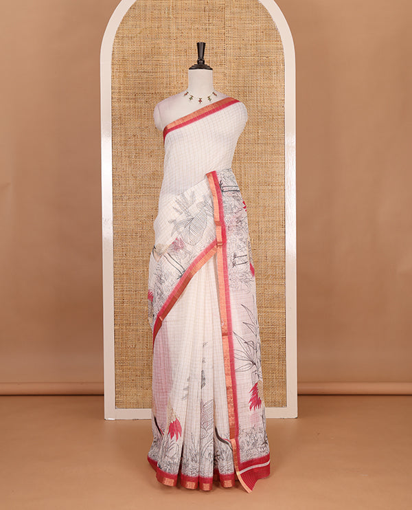 White with pink zari checks linen saree with contrast border and unique designs of pallu along with contrast plain blouse