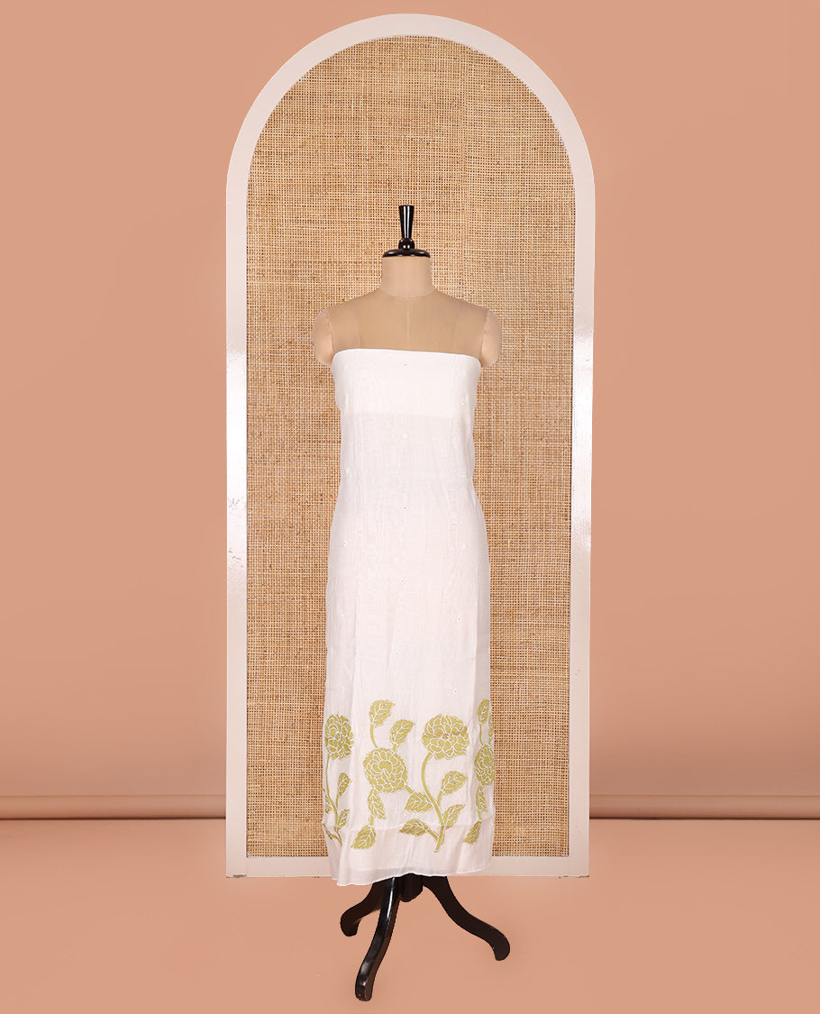 Cream and Green Mul Chanderi Material Chudidar Set, Meticulously Crafted with Floral Embroidery On Its Top, A Plain Santoon Bottom, and Comes with a Contrast Scallop Floral Embroidered Dupatta