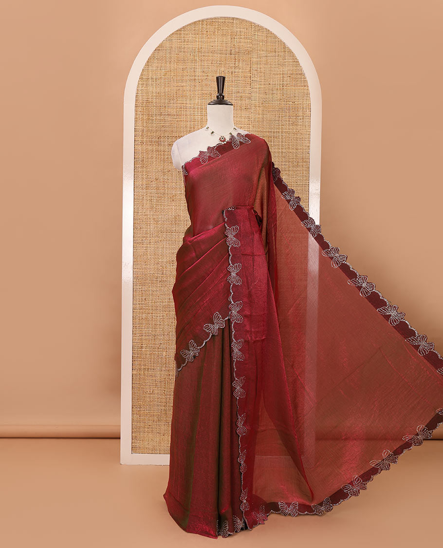 Maroon full-plain Fendi chiffon saree, scallop butterfly-style Swarovski stone work border & stone work matching blouse
