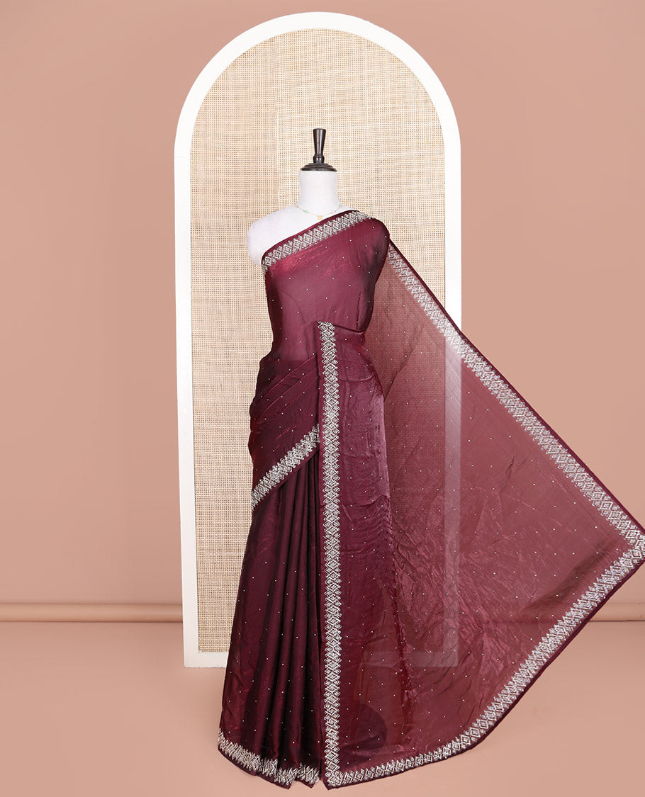 Maroon Designer Saree, Embellished with Stone Struck on Its Body, Highlighted by a Stone Embroidered Border, Self-Pallu, and Paired with a Matching Blouse
