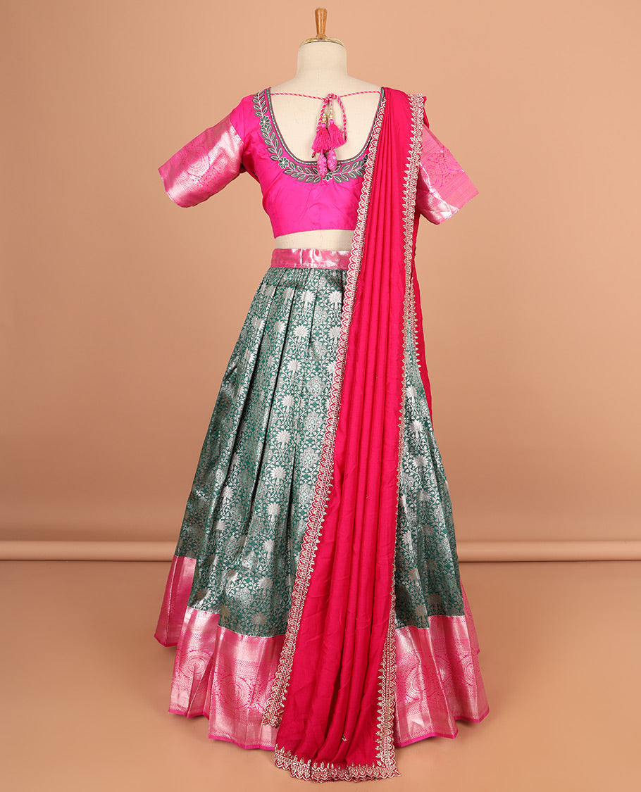 Green floral jacquard half saree with contrast zari design border , floral fembroidery blouse & floral embroidery scallop border dhavani