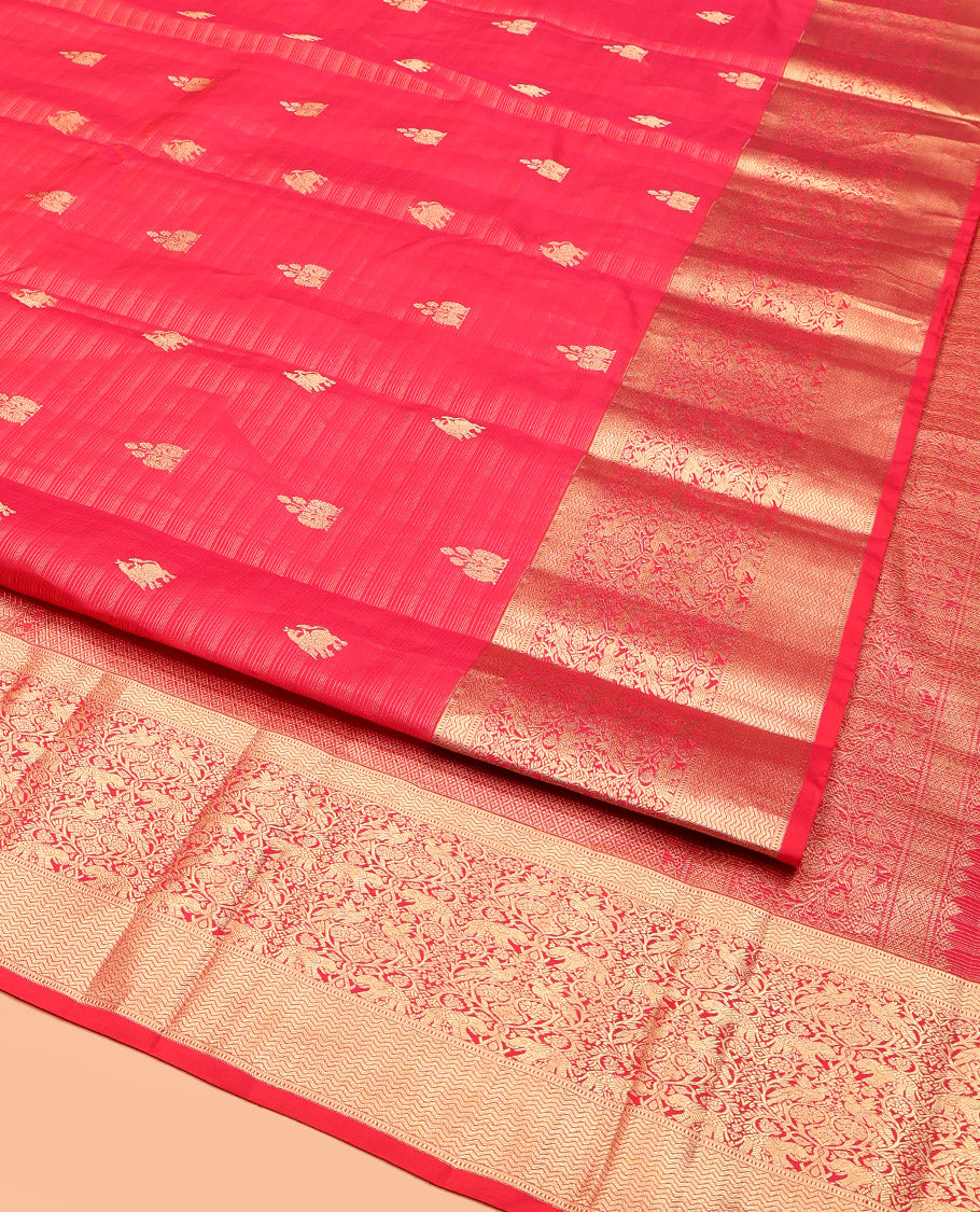 Red Vasundhara Silk Saree, Elegantly Highlighted with Zari Buttas, Highlighted by a Vanasingaram-Style Zari Vanki Border, Jaal Pallu, and a Matching Blouse