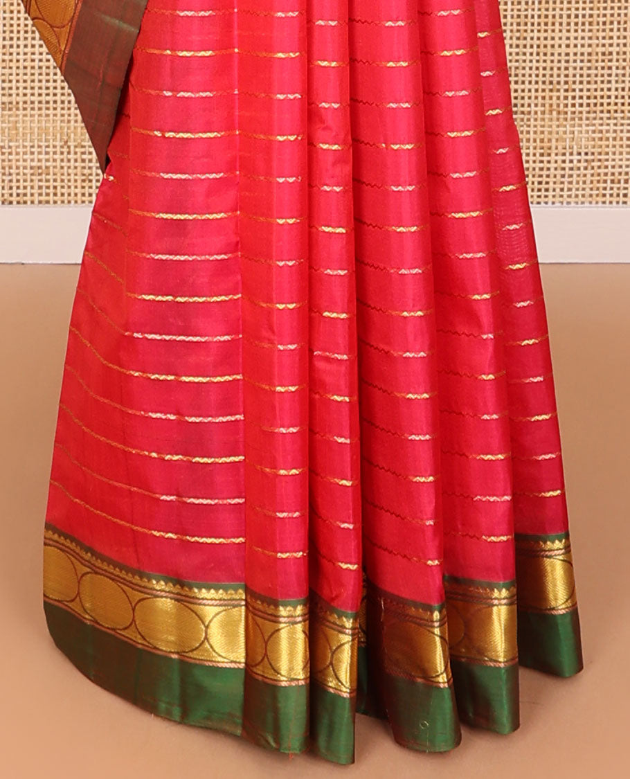 Red striped kancheepuram silk saree with contrast ganga jamuna border of thilakam mokku, banaras, paun & zari design pallu
