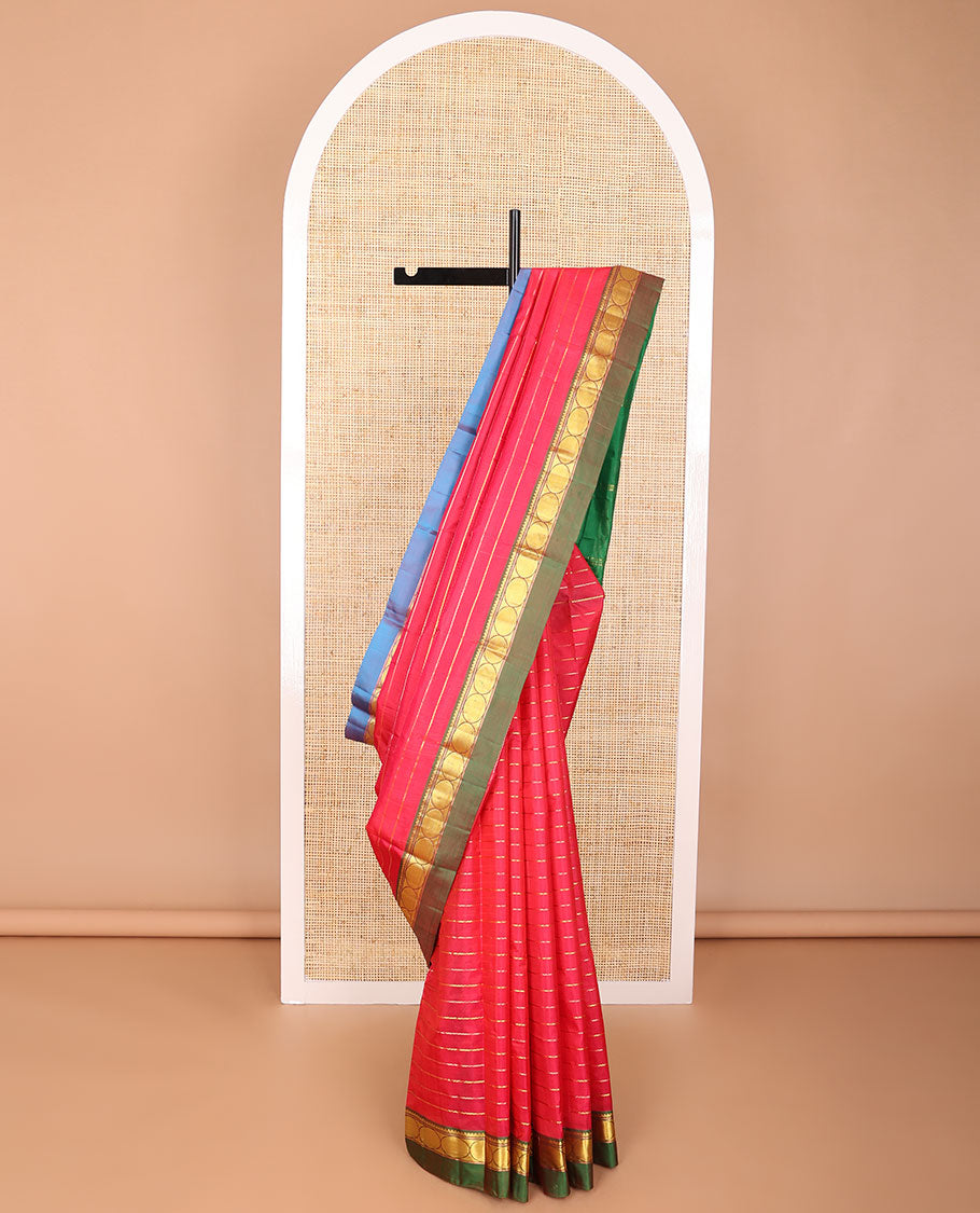 Red striped kancheepuram silk saree with contrast ganga jamuna border of thilakam mokku, banaras, paun & zari design pallu