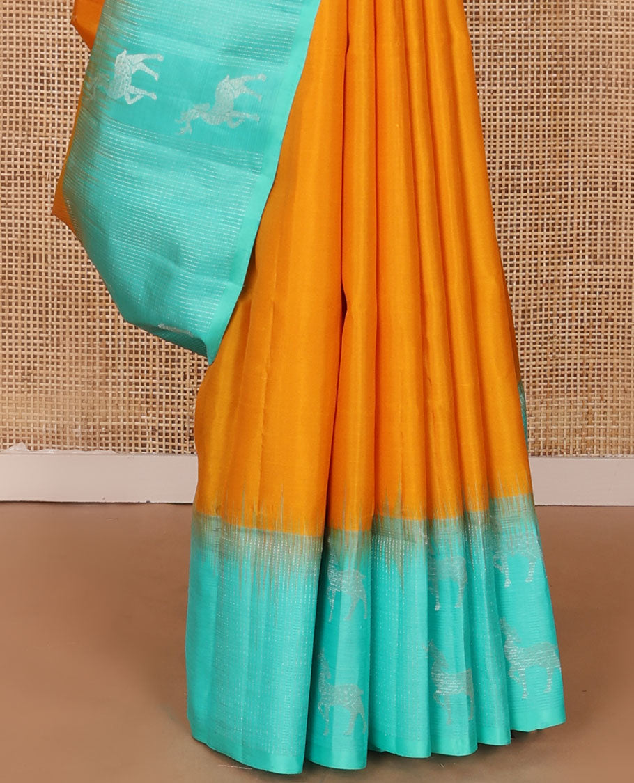 Yellow zari buttas soft silk saree, contrast temple maan motifs border & paiyaadi kann pallu