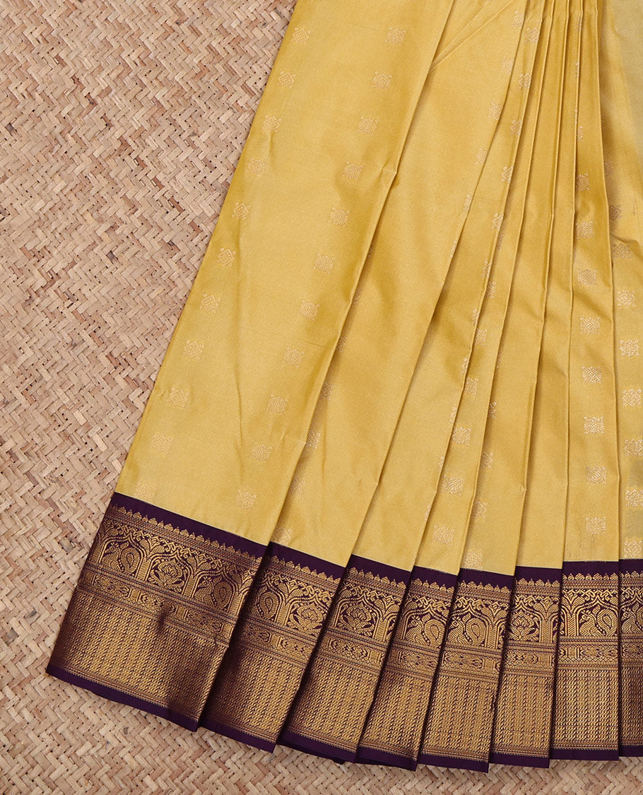 Yellow Budget Silk Saree, Sparsely Woven with Zari Buttas All Over Its Body, Complemented by a Contrast Traditional Zari Design Border, Grand Jaal Pallu, and Paired with a Contrast Blouse