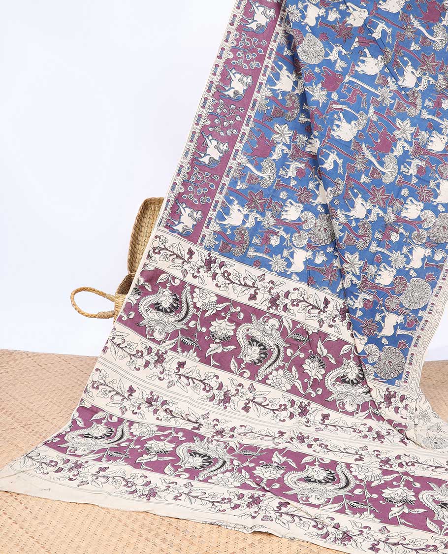 Blue animal motifs machine-printed kalamkari cotton saree, contrast Pichwai cow border & intricate pallu