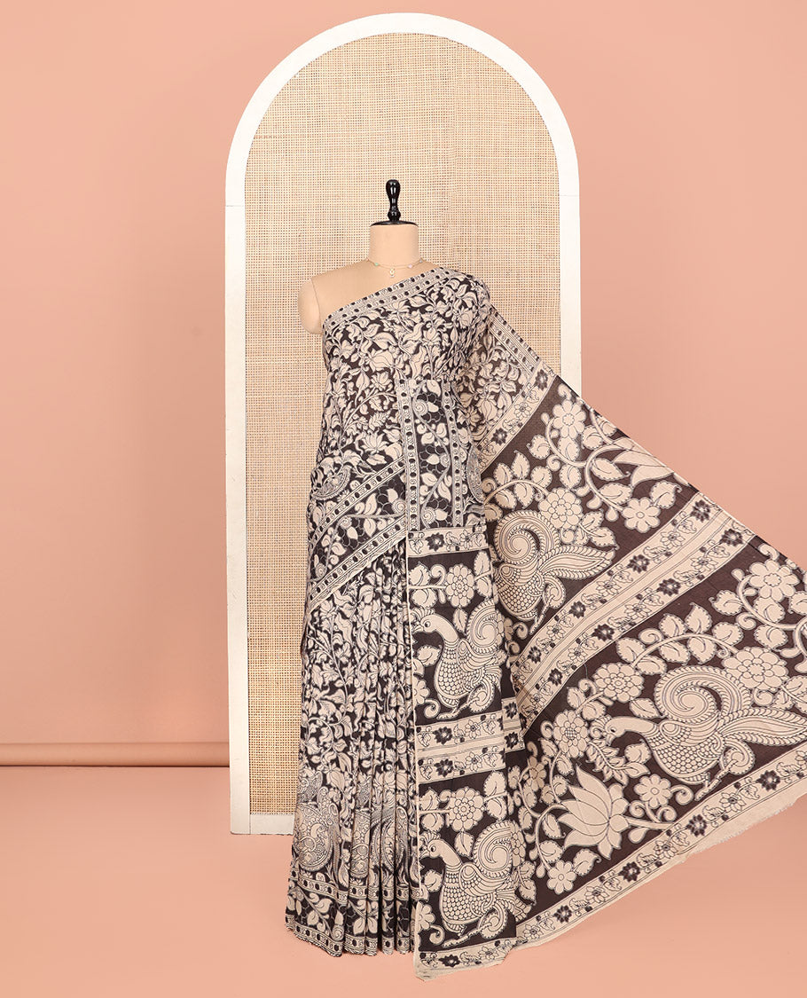 Black Kalamkari Cotton Saree, Impeccably Styled with Floral Vine Print, Floral Printed Border, Pallu of Peacock Motifs, and a Matching Blouse