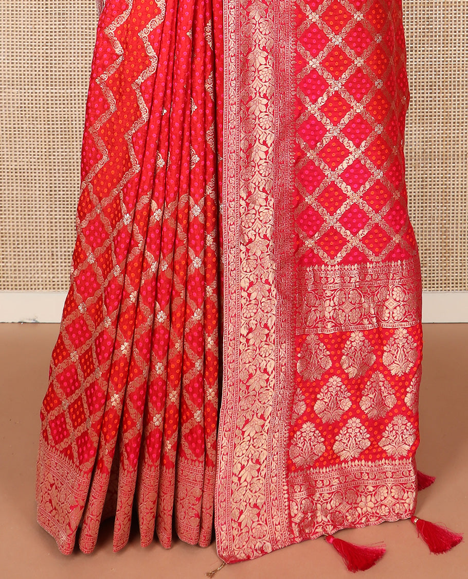 Red bandhani dottes enclosed jaal dola silk saree, traditional zari border, and pallu of intricate designs