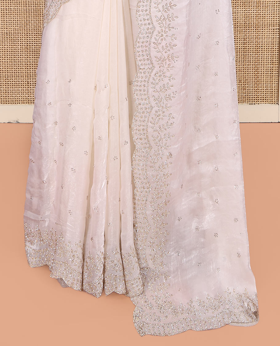 White Designer Saree, Enthralled with Stone Work All Over Its Body, a Scallop Stone Embroidered Border, and Matching Blouse