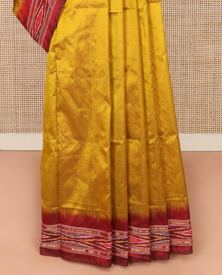 Mustard Plain Ikkat Silk Saree with a Contrast Border Enhanced by an Ikkat Weave, Pallu Features Stripes and Ikkat Texture
