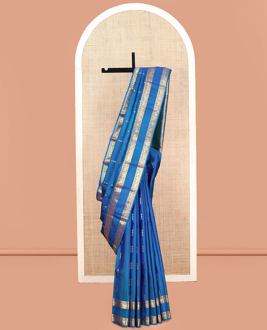 Blue Kanchipuram Silk Saree, Majestically Detailed with Zari Buttas, Highlighted by Zari Traditional Rettai Pettu Border, Grand Pallu, and Matching Blouse