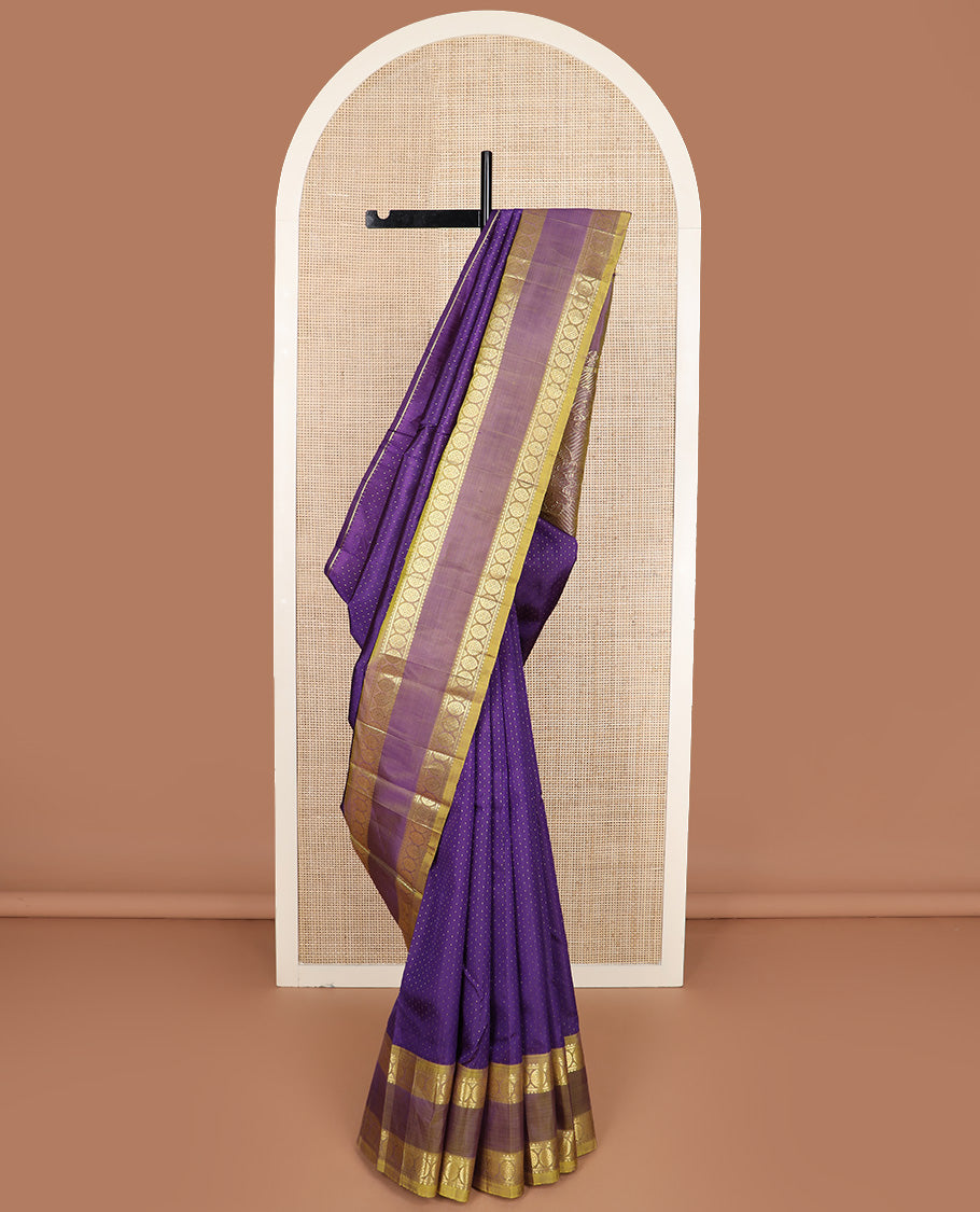 Blue zari buttas Kanchipuram silk saree, contrast one-sided rettai pettu border of rekku and poo chakram, and zari design pallu