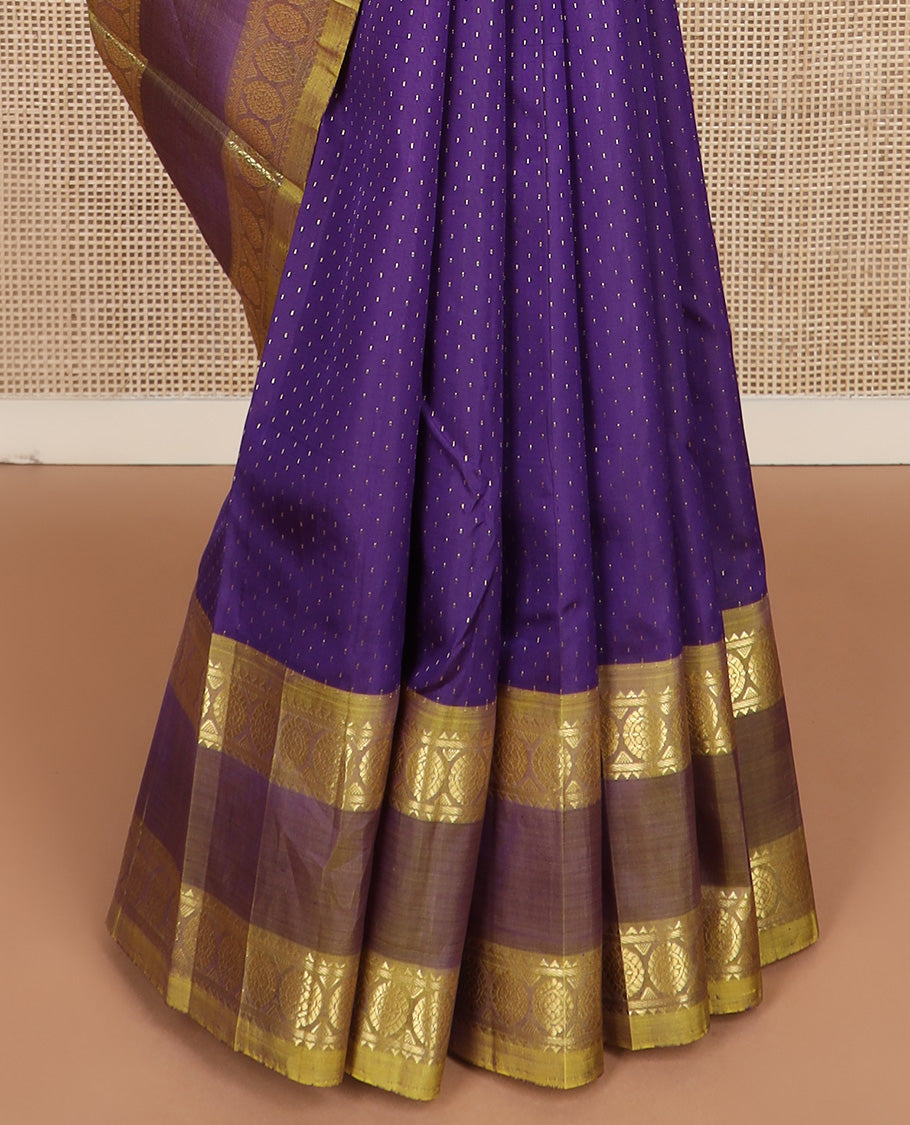 Blue zari buttas Kanchipuram silk saree, contrast one-sided rettai pettu border of rekku and poo chakram, and zari design pallu