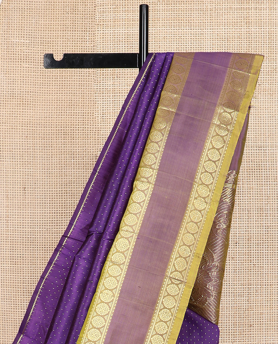 Blue zari buttas Kanchipuram silk saree, contrast one-sided rettai pettu border of rekku and poo chakram, and zari design pallu