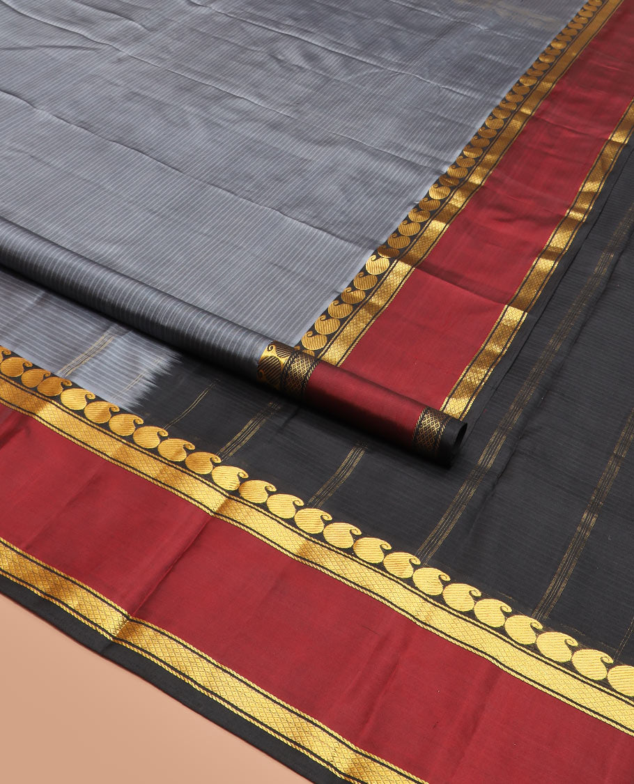 Grey Striped Kanchipuram Silk Saree Adorned with a Contrast Rettai Pettu Border Featuring Manga, Banaras, and Mayil Kann Designs, a Subtle Striped Pallu, and a Contrast Blouse