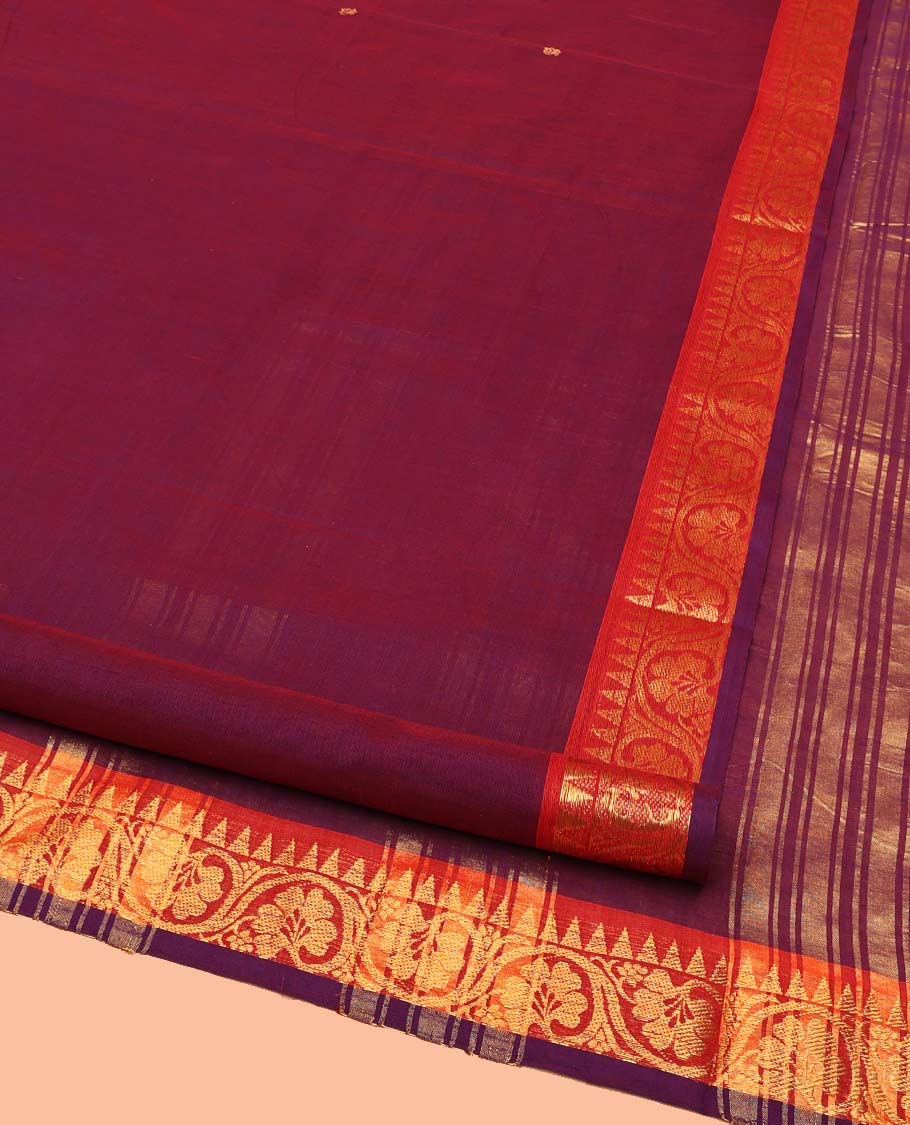 Purple Nine-Yard Cotton Saree Subtly Sparkled with Buttas All Over Its Body, Complemented by Contrast Temple Border of Floral Creeper Designs, a Gleaming Zari-Striped Pallu, and Comes Without a Blouse