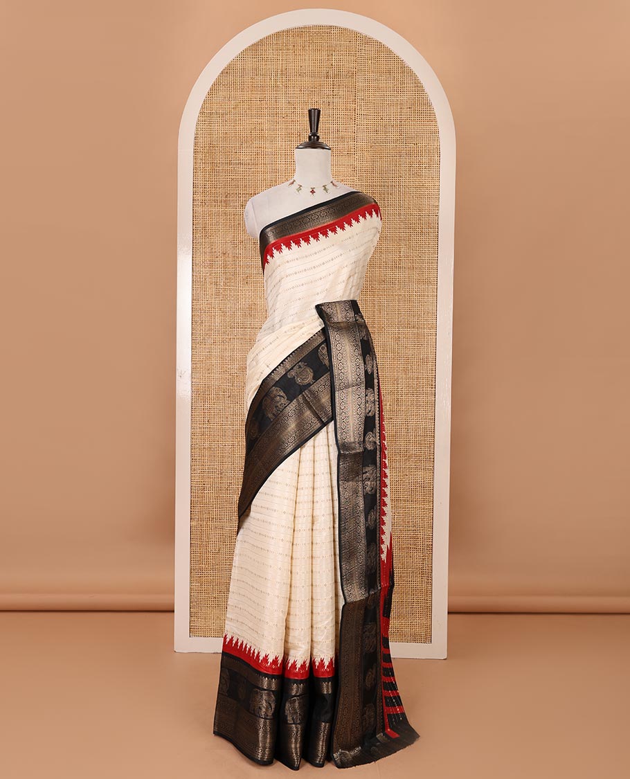 Cream veldhari zari striped dola silk saree, contrast temple border of elephant & Annam motifs, striped temple pallu & contrast veldhari weaving blouse