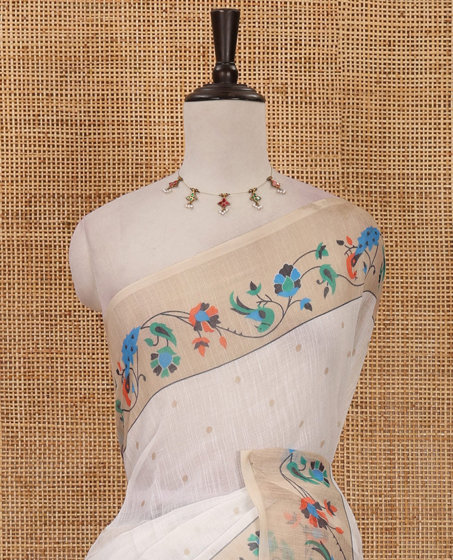 White small dotted buttas linen cotton saree, contrast border & pallu of paithani-style parrot, peacock, & floral vine designs