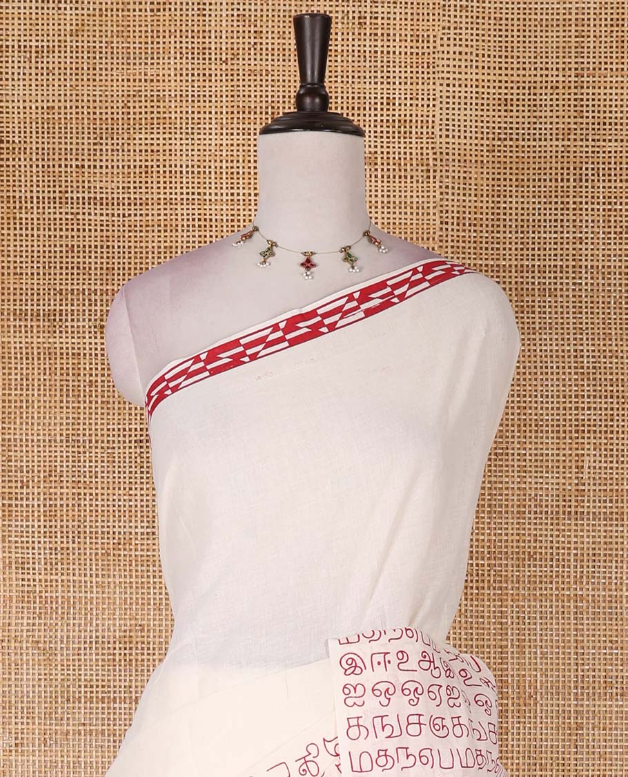 Borderless half-white and red Tamil letters printed Sungudi cotton saree with contrast Tamil letters printed blouse