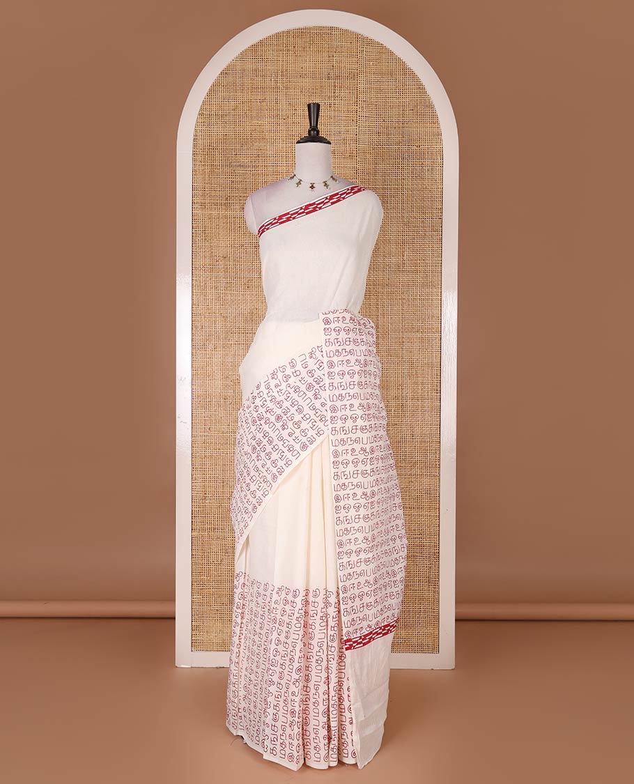 Borderless half-white and red Tamil letters printed Sungudi cotton saree with contrast Tamil letters printed blouse