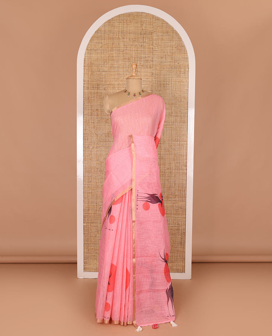 Pink sun and deer silhouette printed linen cotton saree, gold zari piping border, printed pallu, and a matching stripes printed blouse