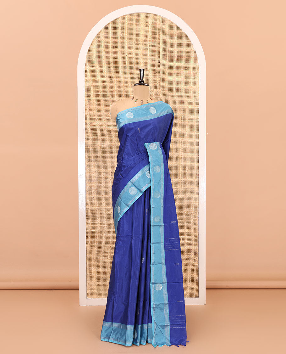 Royal blue zari buttas semi-soft silk saree, contrast thazampoo rekku zari buttas and striped border, striped pallu, and a plain blouse