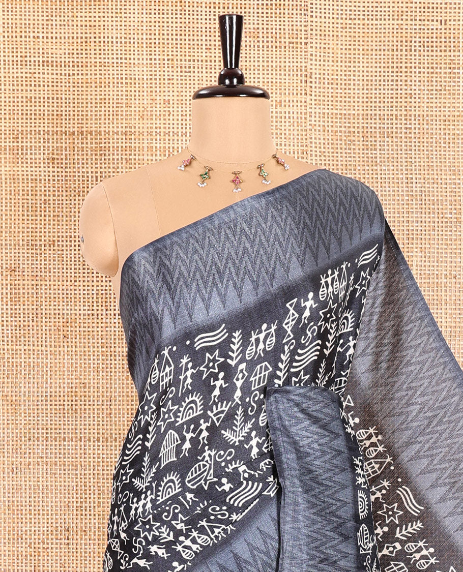 Blue Art Khadi Cotton Saree Ornamented with Warli-Village Theme Print, Complemented with a Contrasting Chevron-Printed Border, Vibrantly Warli-Printed Pallu, and a Plain Blouse