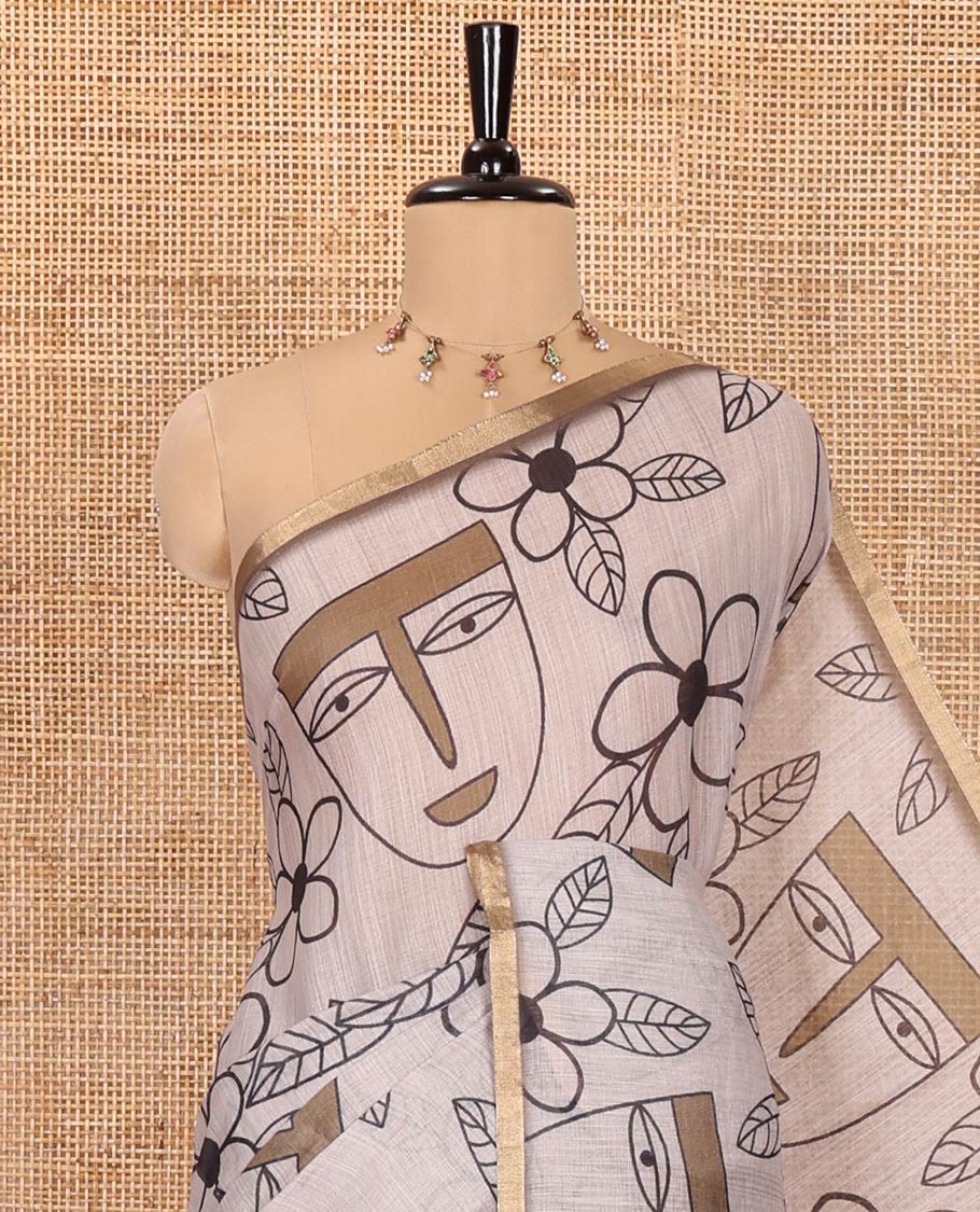Green Linen Cotton Saree, Showcasing Flowers and Faces Printed on Its Body, Subtle Zari Piping Border, Pallu Mirrors the Self-Print, and Comes with a Contrast Blouse