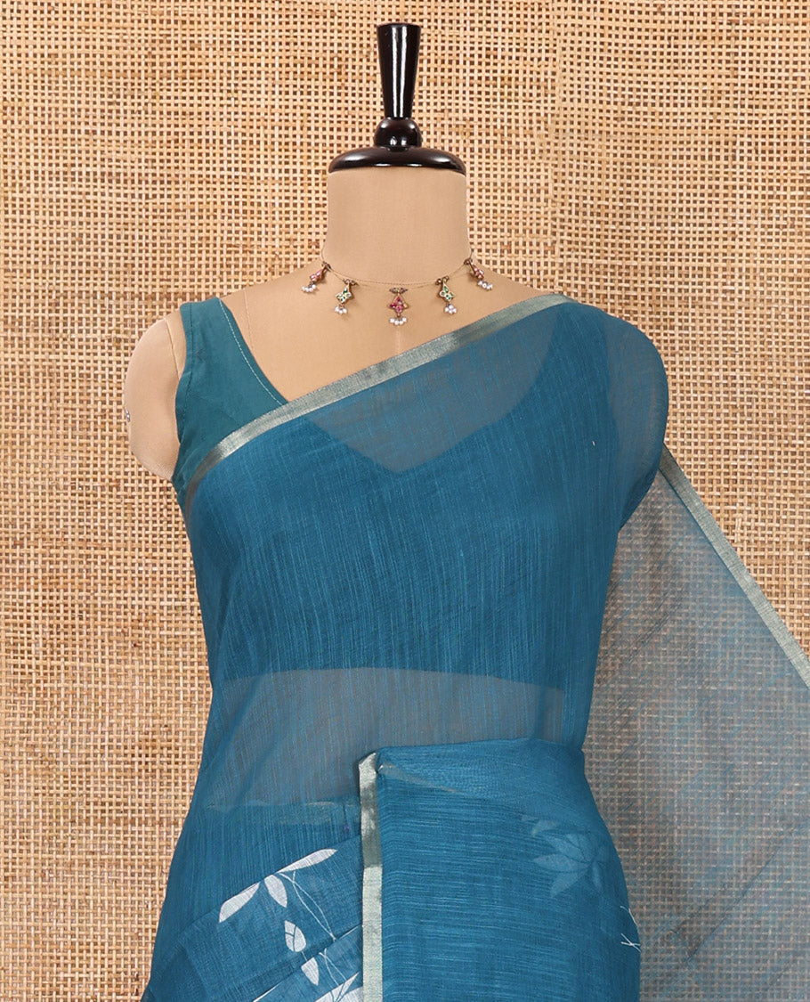 Blue Linen Cotton Saree, Adorned with Pichwai Lotus Motifs Print, Subtle Piping Border, Pallu Mirrors the Same Pichwai Lotus Print, and Paired with a Contrast Pichwai Lotus Printed Blouse