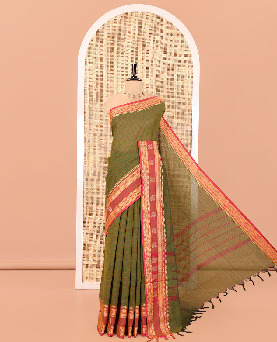 Green Chettinad Cotton Saree, Subtly Sparkled with Checks on Its Body, Complemented by a Contrast Traditional Border of Peacock Designs, Subtly Striped Pallu, and Paired with a Matching Blouse