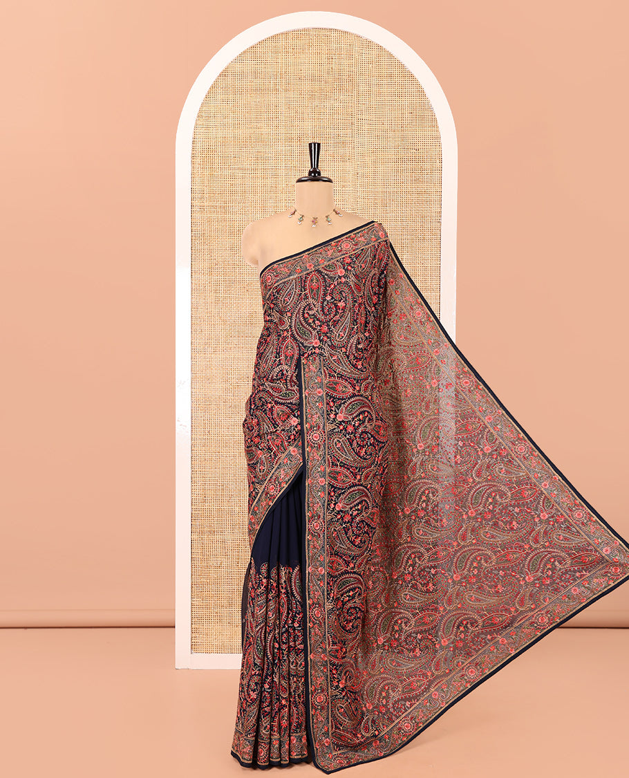 Navy Blue Georgette Saree, Ornamented with Intricate Paisleys, Kashmir Embroidered and Stone Work on Its Body, a Self-Embroidered Border, and Paired with an Embroidered Blouse